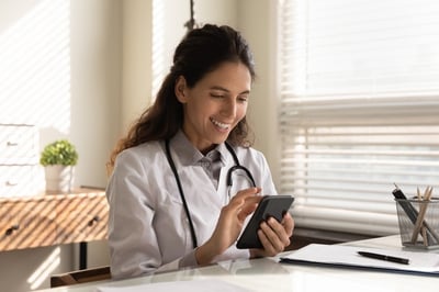 Smiling-female-doctor-use-smartphone-in-hospital-1293277479_6720x4480-1-Jul-17-2024-06-21-40-2836-PM