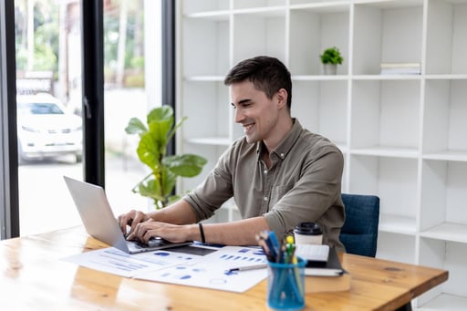 male-european-adult-business-office-typing-on-his-laptop-print